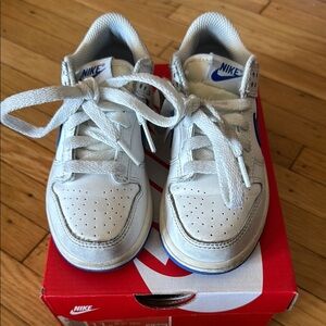 Nike White Low-Top Sneakers with Perforated Design